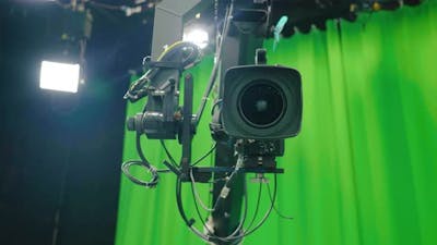 Video camera crane moves smoothly towards the stage when shooting a television show.