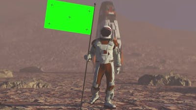 Astronaut Walking on the Mars with Green Screen Flag.