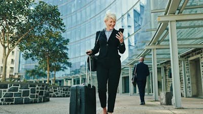 Business woman, suitcase and phone in city with funny communication, transport meme and travel news.