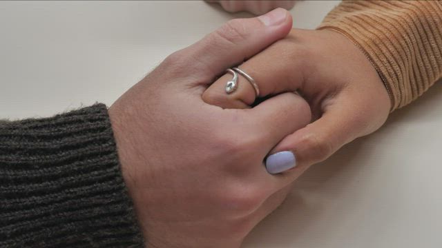 Hands of a loving couple.